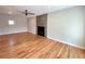 Spacious living room with sleek fireplace and plenty of room for entertaining guests at 8239 Nola Dr, Denver, CO 80221