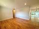 Spacious living room featuring hardwood floors and recessed lighting at 8239 Nola Dr, Denver, CO 80221
