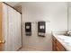Bathroom featuring neutral walls, decorative towels, and a patterned shower curtain at 424 Wright St # 102, Lakewood, CO 80228