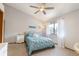 Inviting bedroom with soft lighting and a plush bed at 424 Wright St # 102, Lakewood, CO 80228