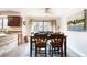Bright dining area features a large window with nice views of the outdoors at 424 Wright St # 102, Lakewood, CO 80228