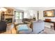 Inviting living room with cozy fireplace and lots of natural light at 424 Wright St # 102, Lakewood, CO 80228