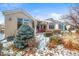 Charming home featuring a private backyard patio with a pergola and well-maintained landscaping at 6700 W Dorado Dr # 51, Littleton, CO 80123