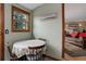 Charming breakfast nook with a view, perfect for enjoying morning meals in a cozy setting at 26367 Pressler St, Conifer, CO 80433