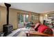 Inviting living room with a wood-burning stove, sliding glass doors, and comfortable seating at 26367 Pressler St, Conifer, CO 80433