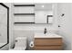 Bright bathroom with open shelving, a modern vanity, and a sleek mirror adds modern touches at 1601 Park Ave # 106, Denver, CO 80218
