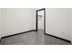 Empty bedroom features concrete floors and a closet at 1601 Park Ave # 106, Denver, CO 80218