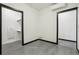 Corner of empty bedroom shows closet doors at 1601 Park Ave # 106, Denver, CO 80218