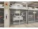 Close-up of an indoor car elevator providing a secure and efficient parking solution for residents at 1601 Park Ave # 106, Denver, CO 80218
