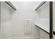 Walk-in closet with multiple shelves for storage at 1601 Park Ave # 106, Denver, CO 80218