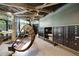Cozy lobby area with hanging chairs, mailboxes, a unique ceiling design, and an industrial feel at 1601 Park Ave # 106, Denver, CO 80218