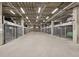 Modern parking garage featuring a car elevator system, ensuring a secure and organized vehicle storage solution at 1601 Park Ave # 106, Denver, CO 80218