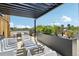 Enjoy the rooftop deck, complete with city views, patio furniture, and an outdoor dining area at 1601 Park Ave # 106, Denver, CO 80218