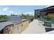 Fantastic roof deck with stainless steel grill, bar stool seating, and downtown city views at 1601 Park Ave # 106, Denver, CO 80218
