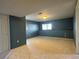 Finished basement with neutral walls and carpet flooring at 1517 Stanley Dr, Erie, CO 80516