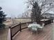 Spacious deck with table and chairs, overlooking the neighborhood at 1517 Stanley Dr, Erie, CO 80516