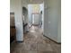 Bright foyer boasts tile floors, arched doorways and a high ceiling for a grand entrance at 1517 Stanley Dr, Erie, CO 80516
