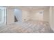 Spacious finished basement with neutral carpet and access to stairs, perfect for a Gathering room or recreation area at 2065 Depew St, Edgewater, CO 80214