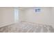 Finished basement with neutral carpeting and bright lighting at 2065 Depew St, Edgewater, CO 80214