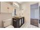 Bathroom features white tile floors and a decorative vanity with a vessel sink at 1830 Newland Ct # 209, Lakewood, CO 80214