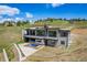 Contemporary home with a balcony and plunge pool, offering a private outdoor retreat with scenic views at 545 Strada Rossa Rd, Golden, CO 80401