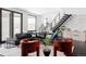 Cozy living room featuring modern staircase and comfortable seating at 545 Strada Rossa Rd, Golden, CO 80401
