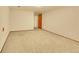 Unfinished basement with neutral carpet and room for customization at 12348 Elizabeth Ct, Thornton, CO 80241