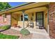 Cozy porch with decorative touches and a charming entrance at 12348 Elizabeth Ct, Thornton, CO 80241
