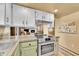 Well-equipped kitchen with stainless steel appliances and granite countertops at 12348 Elizabeth Ct, Thornton, CO 80241