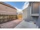 Private backyard with brick patio and storage shed at 1233 S Flower Cir # D, Lakewood, CO 80232