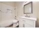 Clean bathroom with white vanity, bathtub, and modern fixtures at 1233 S Flower Cir # D, Lakewood, CO 80232