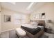 Bedroom with skylights, staged furniture, and neutral carpeting at 1233 S Flower Cir # D, Lakewood, CO 80232