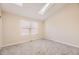 Bright bedroom with skylights and neutral carpeting at 1233 S Flower Cir # D, Lakewood, CO 80232