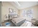 Main bedroom with plenty of natural light and a sitting area at 1233 S Flower Cir # D, Lakewood, CO 80232