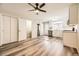 Modern kitchen with white cabinets and stainless steel appliances at 1233 S Flower Cir # D, Lakewood, CO 80232