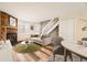 Living room with fireplace, staged furniture, and wood flooring at 1233 S Flower Cir # D, Lakewood, CO 80232