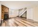 Living room with fireplace and wood flooring at 1233 S Flower Cir # D, Lakewood, CO 80232