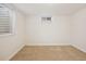 Empty basement bedroom with neutral walls and carpet at 2042 Jamaica St, Aurora, CO 80010