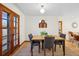 Charming dining area with a modern table, seating for four, and natural light at 2042 Jamaica St, Aurora, CO 80010