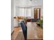 Dining area with a wood table, chairs, and view into living room at 2042 Jamaica St, Aurora, CO 80010