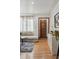 Stylish living room featuring hardwood floors, modern decor, and natural light, perfect for relaxation at 2042 Jamaica St, Aurora, CO 80010