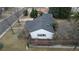 Top-down view of the home's backyard, roof, and landscaping featuring mature trees at 3201 S Albion St, Denver, CO 80222