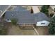 Aerial view displaying the home's layout, including a covered patio and spacious backyard at 3201 S Albion St, Denver, CO 80222
