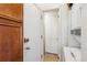 Laundry room with machines visible in alcove at 3201 S Albion St, Denver, CO 80222