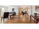Spacious living room with hardwood floors and ample natural light, ideal for entertaining at 3201 S Albion St, Denver, CO 80222