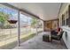 Covered patio featuring outdoor seating, privacy lattice, and a view of the backyard at 3201 S Albion St, Denver, CO 80222