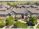 Landscaped townhomes with pathways and manicured greenery at 3662 S Perth Cir # 104, Aurora, CO 80013