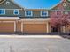 Townhome garages featuring multiple parking spots at 3662 S Perth Cir # 104, Aurora, CO 80013