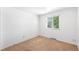 Bedroom with carpet and a window, providing comfort and natural light at 6953 Ingalls St, Arvada, CO 80003