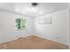 Bedroom with carpet, windows, and light-colored walls, suitable for rest and relaxation at 6953 Ingalls St, Arvada, CO 80003